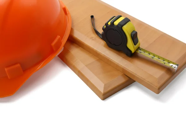 Hardhat with a ruler — Stock Photo, Image