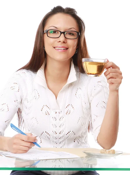 Business woman having tea — стоковое фото