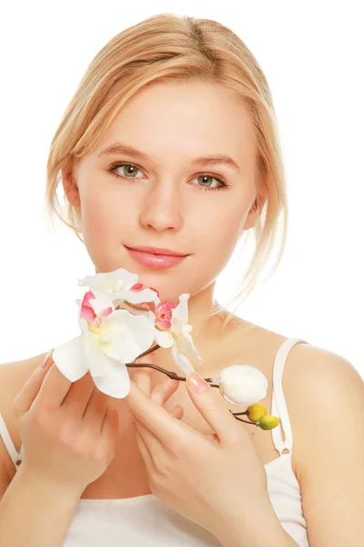 Vrouw met een bloem — Stockfoto