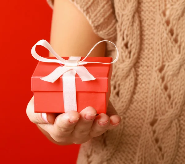 Female hand holding gift box Stock Image