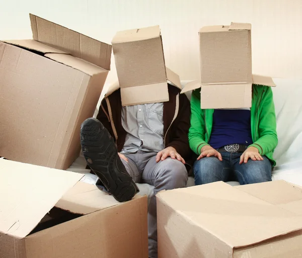 Young couple resting from moving into a new home — Stock Photo, Image