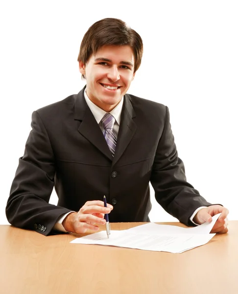 Young business man on a desk — Stock Photo, Image