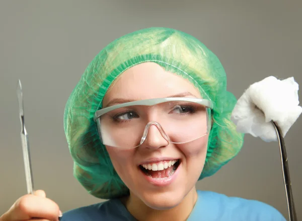 Woman doctor surgeon  with scalpel — Stock Photo, Image