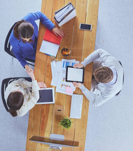 Business people shaking hands during meeting in office — Stock Photo, Image