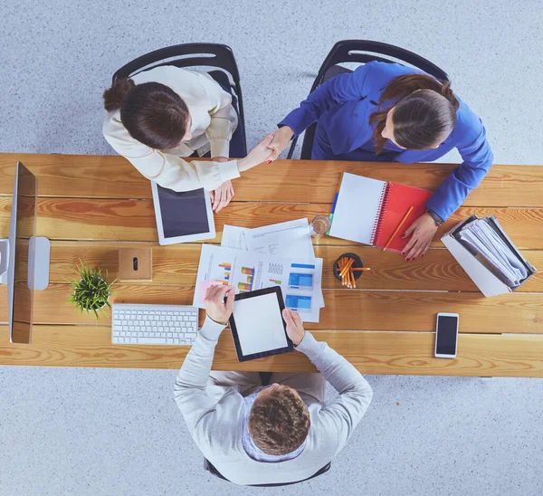 Business people shaking hands during meeting in office — Stock Photo, Image