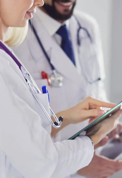 Two Doctors Holding Talking Patient — Stock Photo, Image