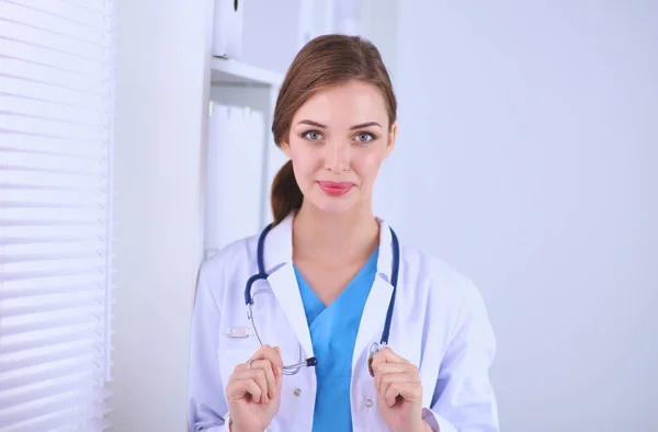 Woman Doctor Standing Window Crossed Arms Isolated — Stock Photo, Image