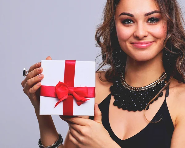 Young Woman Happy Smile Hold Gift Box Hands Isolated Grey — Stock Photo, Image