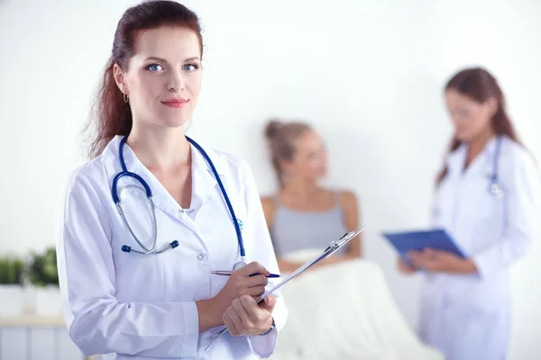 Two Woman Doctors Standing Patient Hospital — Stock Photo, Image