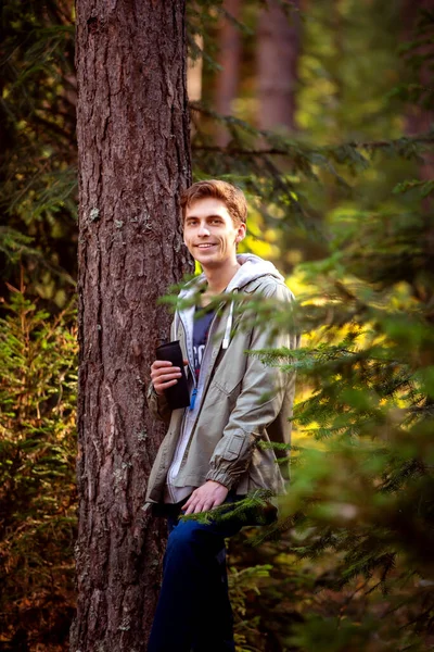 Portrait Young Smiling Man Coffee Thermo Mug Hands Autumn Forest — Stock Photo, Image