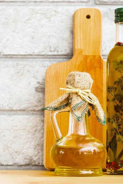 Extra virgin healthy Olive oil on grey bricks background — Stock Photo, Image