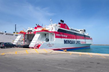 Heraklion, Greece - April 27, 2019: Crete island port and Minoan Lines highspeed ferry boat