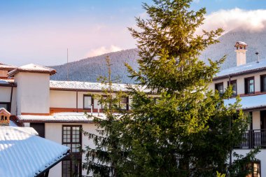 Winter house in mountain snow landscape at Christmas, Bansko, Bulgaria