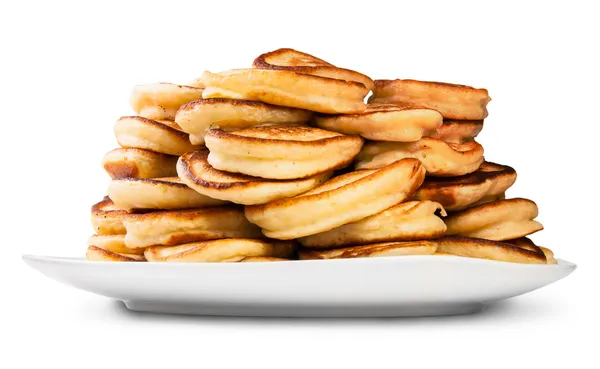 Hög med pannkakor på en vit platta — Stockfoto
