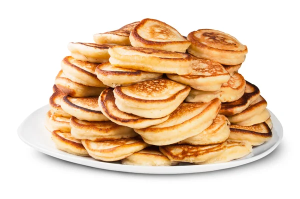 Hög med pannkakor på en vit platta roteras — Stockfoto