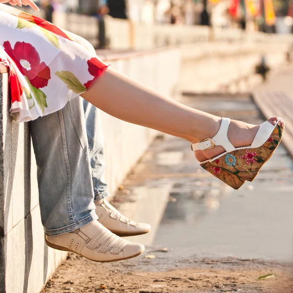 Male and female legs during a date — Stock Photo, Image