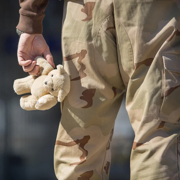 Hands of a man with a toy — Stock Photo, Image