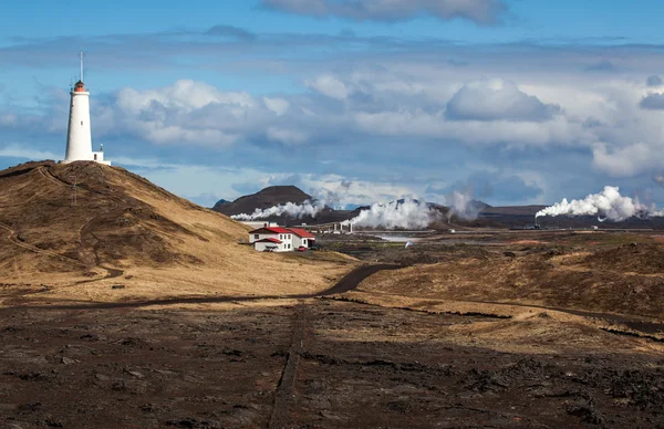 Geothermal area and lighthouse — Stock Photo, Image