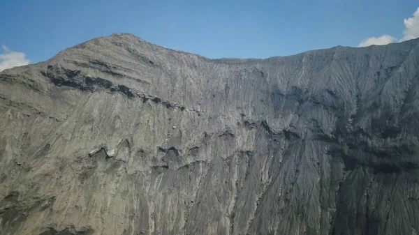 表面の自然景観火山性土壌の質感の背景ブロモ・テンガー・セメル国立公園のブロモ山の斜面インドネシア — ストック写真