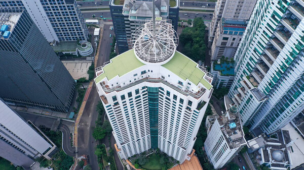 Jakarta, Indonesia, 23-05-2022. Ayana Midplaza luxury hotel in Jakarta with tall building nearby.