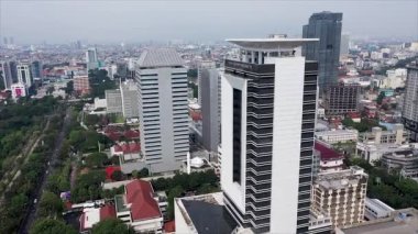 Flight among the buildings of beautiful Jakarta.