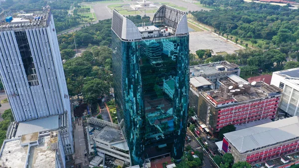 Blue glass OFFICE BUILDING IN CENTRAL JAKARTA. The ministry of state enterprises.