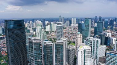Aerial view group of high rise colorful residential apartments in Jakarta city. Urban concept. Panoramic style.