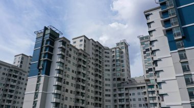 Aerial view group of high rise colorful residential apartments in Jakarta city. Urban concept. Panoramic style.