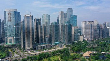 Rows of high-rise buildings are immortalized from a height in Jakarta.