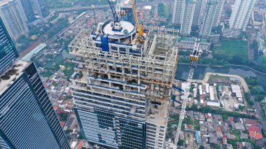 Top down view on different sky scrapers in a big city, fly over.