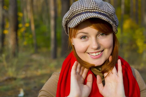 Beautiful smiling girl in cap — Stock Photo, Image