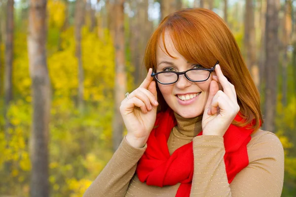 Portrait of beautiful red-haired girl in glasses — Stock Photo, Image