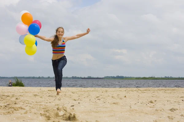 Mladá dívka s balónky — Stock fotografie