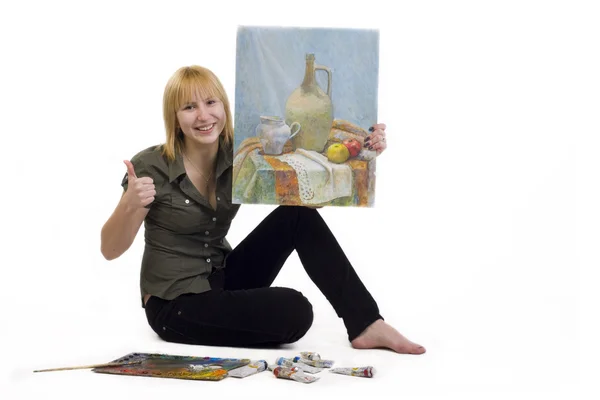 Dívka s obrázkem v rukou na bílém pozadí — Stock fotografie
