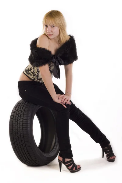 Girl and  tire cover — Stock Photo, Image