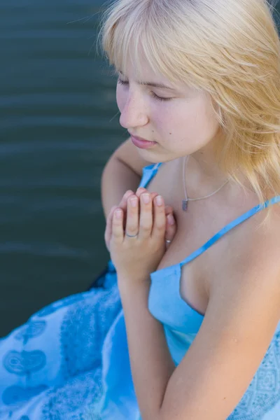 Portrait of the praying girl — Stock Photo, Image
