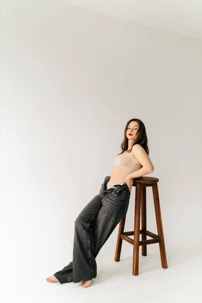 Young Sexy Model Posing Photo Bar Stool Studio White Background — Stock Photo, Image