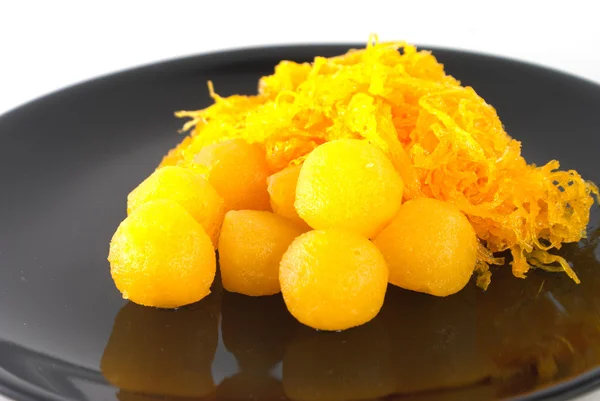 Золоті яєчні жовтки краплі та яєчні жовтки — стокове фото