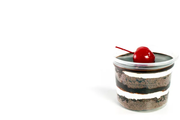 Chocolate cup cake and cherry on white background — Stock Photo, Image