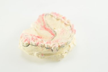 Diş destek ve beyaz arka plan üzerinde hizmetli.