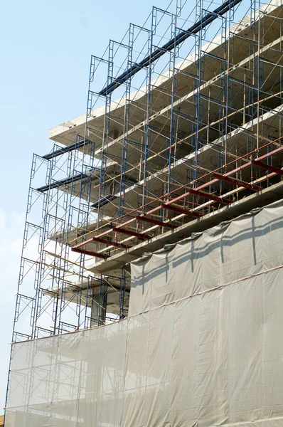 Fassade und Gebäude mit Baustelle — Stockfoto