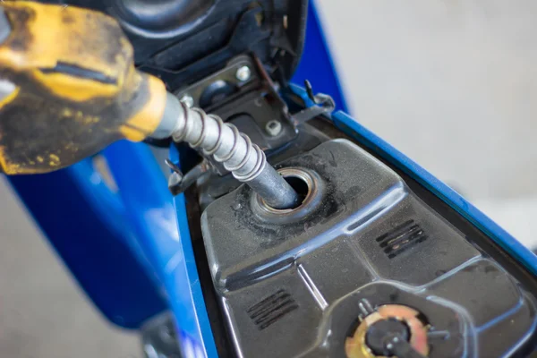 Refueling a motorcycle at a gas station in thailand — Zdjęcie stockowe