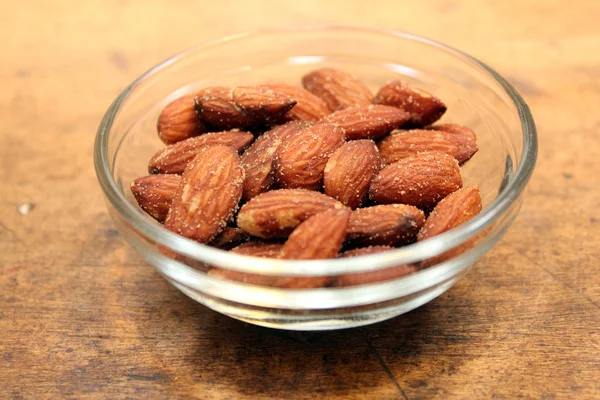 Almonds in dish — Stock Photo, Image