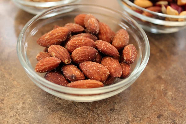 Almonds in dish — Stock Photo, Image