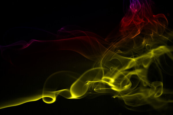 Smoke shape with different colours, main colour: yellow, other colours: red, orange, purple