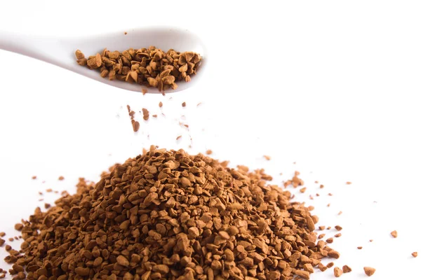 kahve, kaşık ve granül yığını