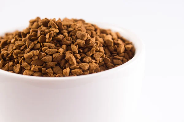 Cup with coffee granules close Stock Picture