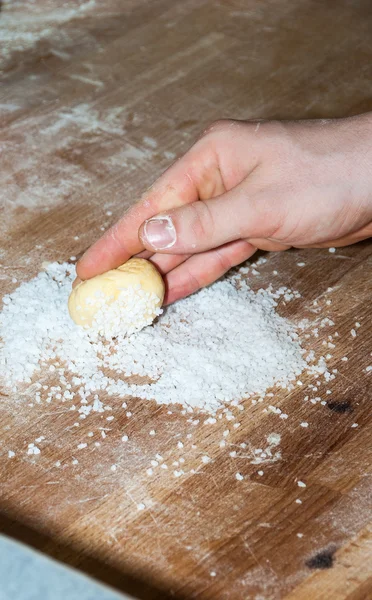 Baker preparing brioche with sugar — Stock Photo, Image