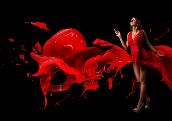 Lady in red. Red dress. Beautiful woman covered in red on a dark background. — Stock Photo, Image