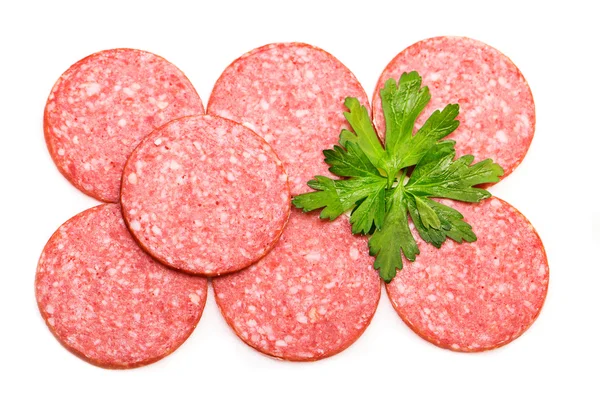 Salami sausage cut into thin slices on a white background — Stock Photo, Image